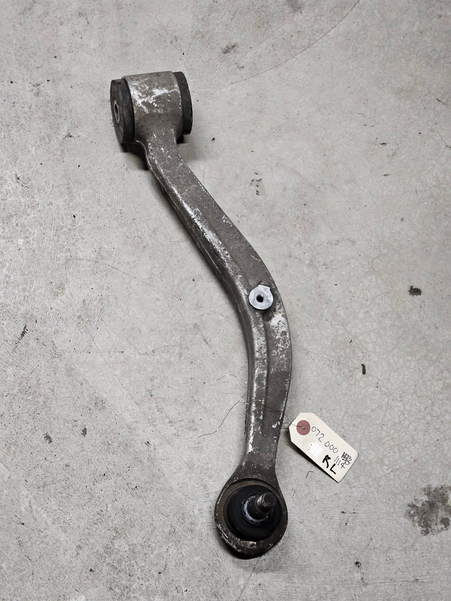 Rear trailing Arm Left - MR594607